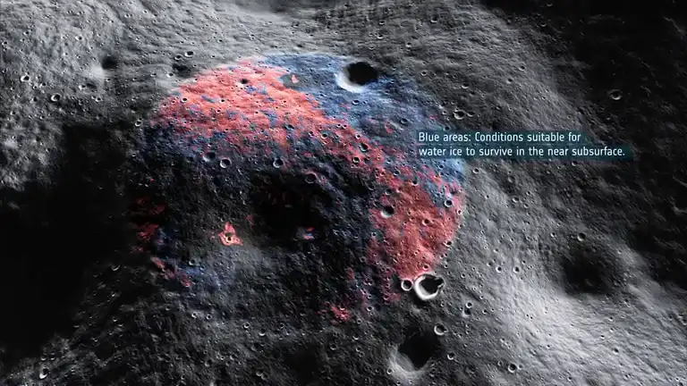 Map of the lunar south polar region with blue areas where water ice could survive just below the surface